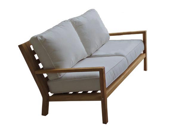 Teak loveseat with off-white cushions, two bolster back pillows, and armrests