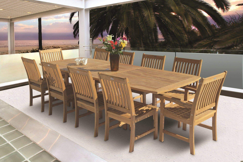 Teak dining side chairs with slatted backs and seats, arranged around a table