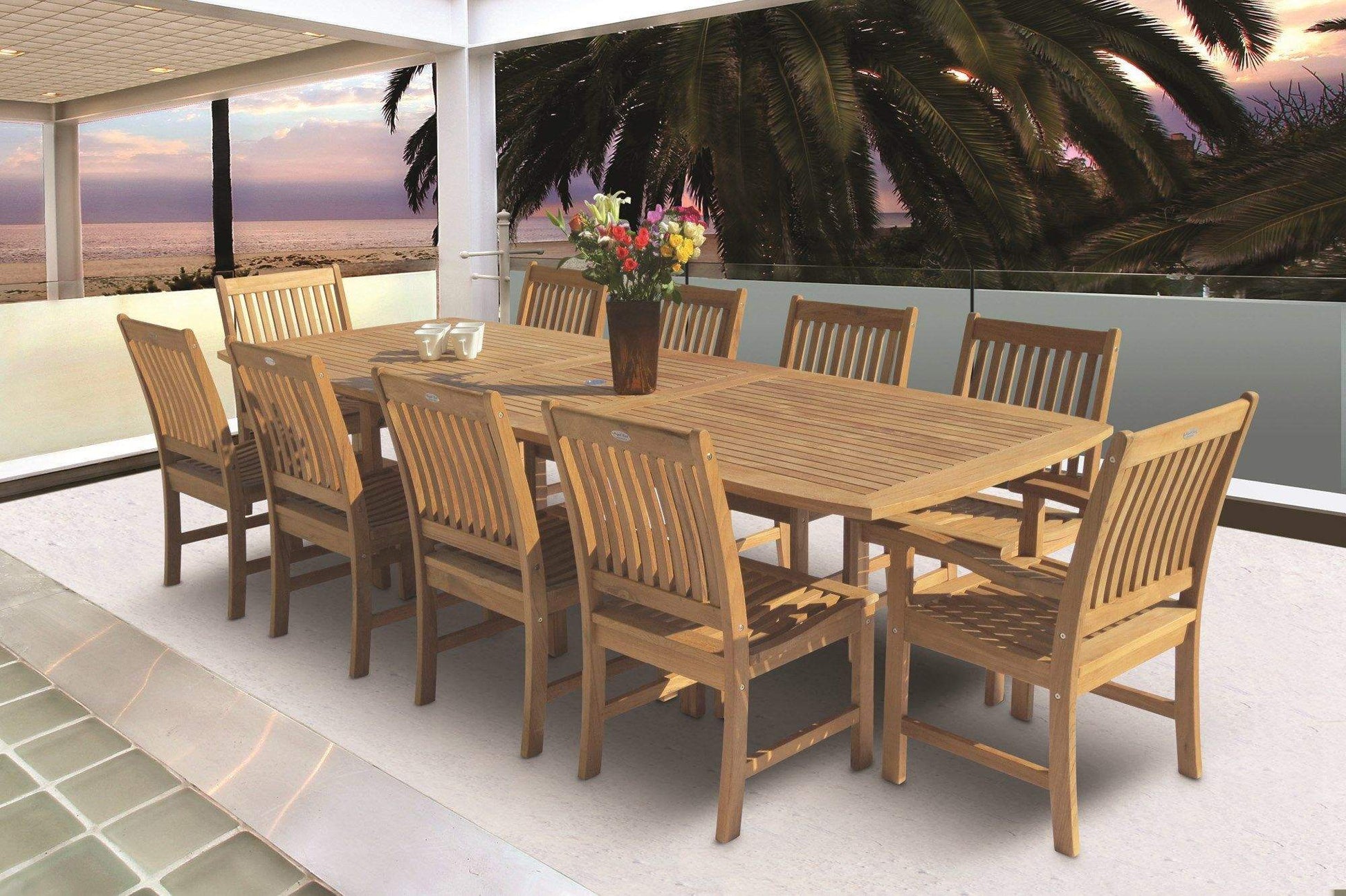 Teak dining side chairs with slatted backs and seats, arranged around a table