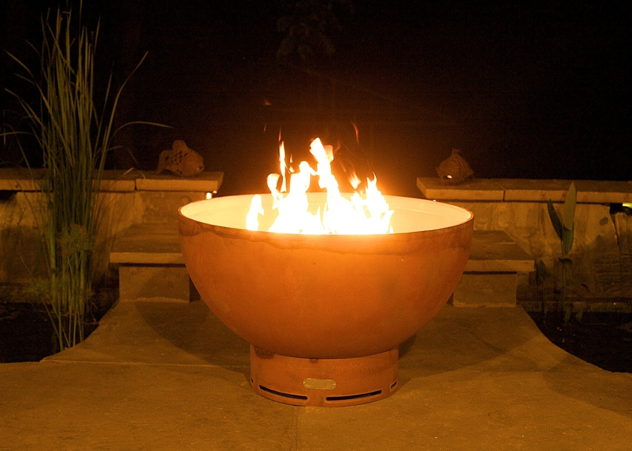 Crater gas fire pit bowl with open flames and vent openings on the base.