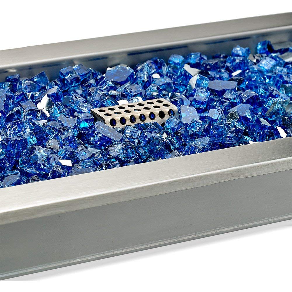 Linear fire pit burner pan filled with blue decorative fire glass and central vented burner guard.