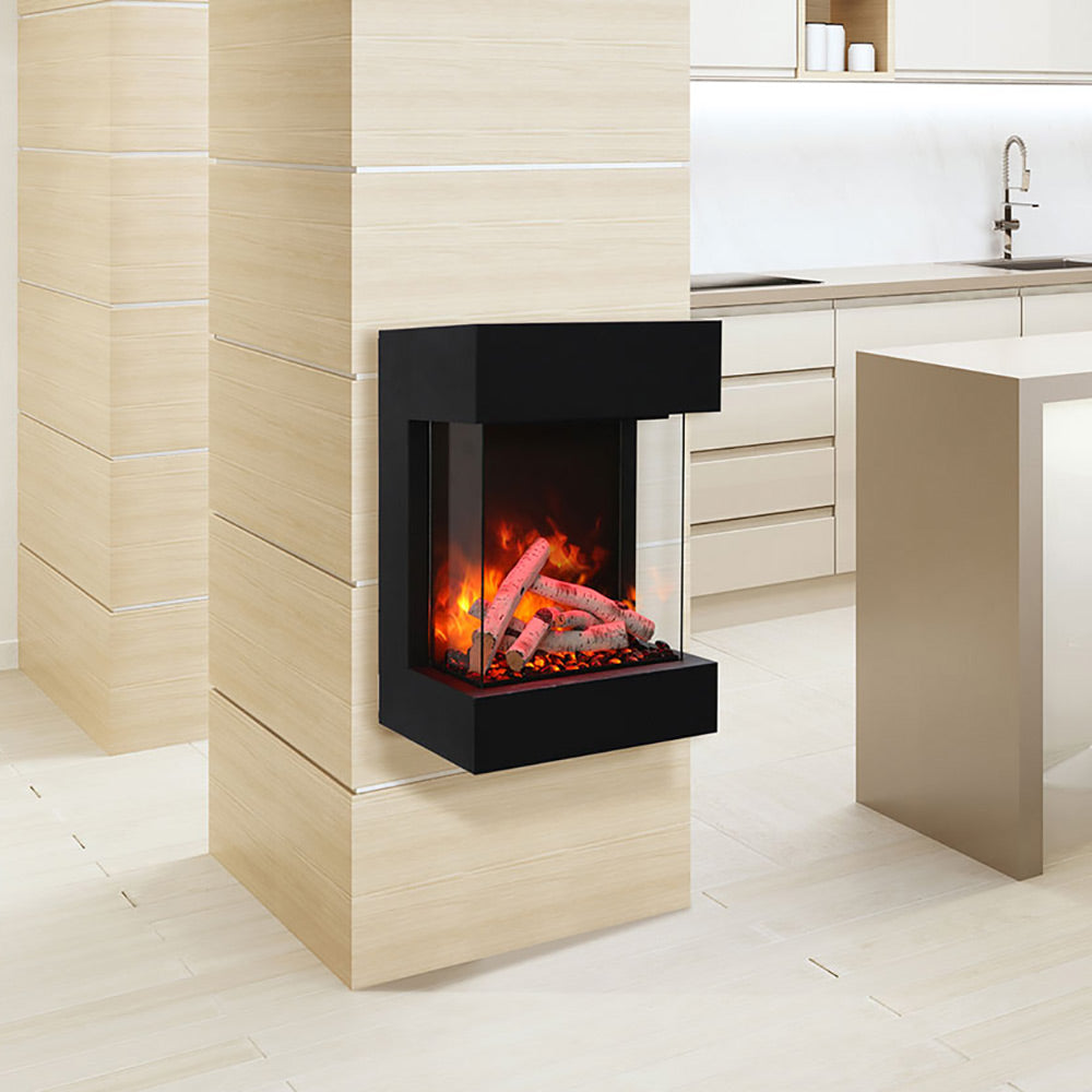 Black cube electric fireplace with flames and faux logs visible through front opening.