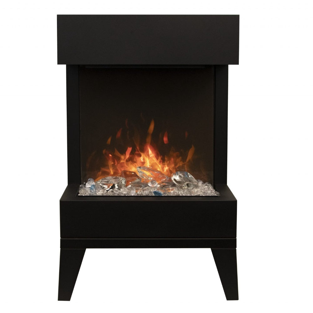 Black electric fireplace with glowing flames, square front, on four legs
