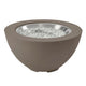 Black bowl gas fire pit with clear glass fire media in stainless ring