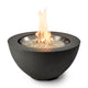 Black bowl gas fire pit with tall flame over glass fire media