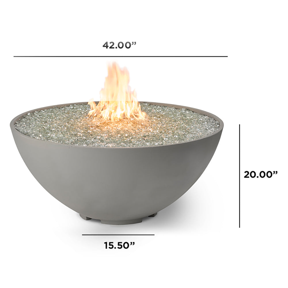 Gas fire pit with dark grey bowl and active flame over sparkling burner