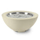 Gas fire pit bowl with cream exterior and glowing burner with silver fire glass