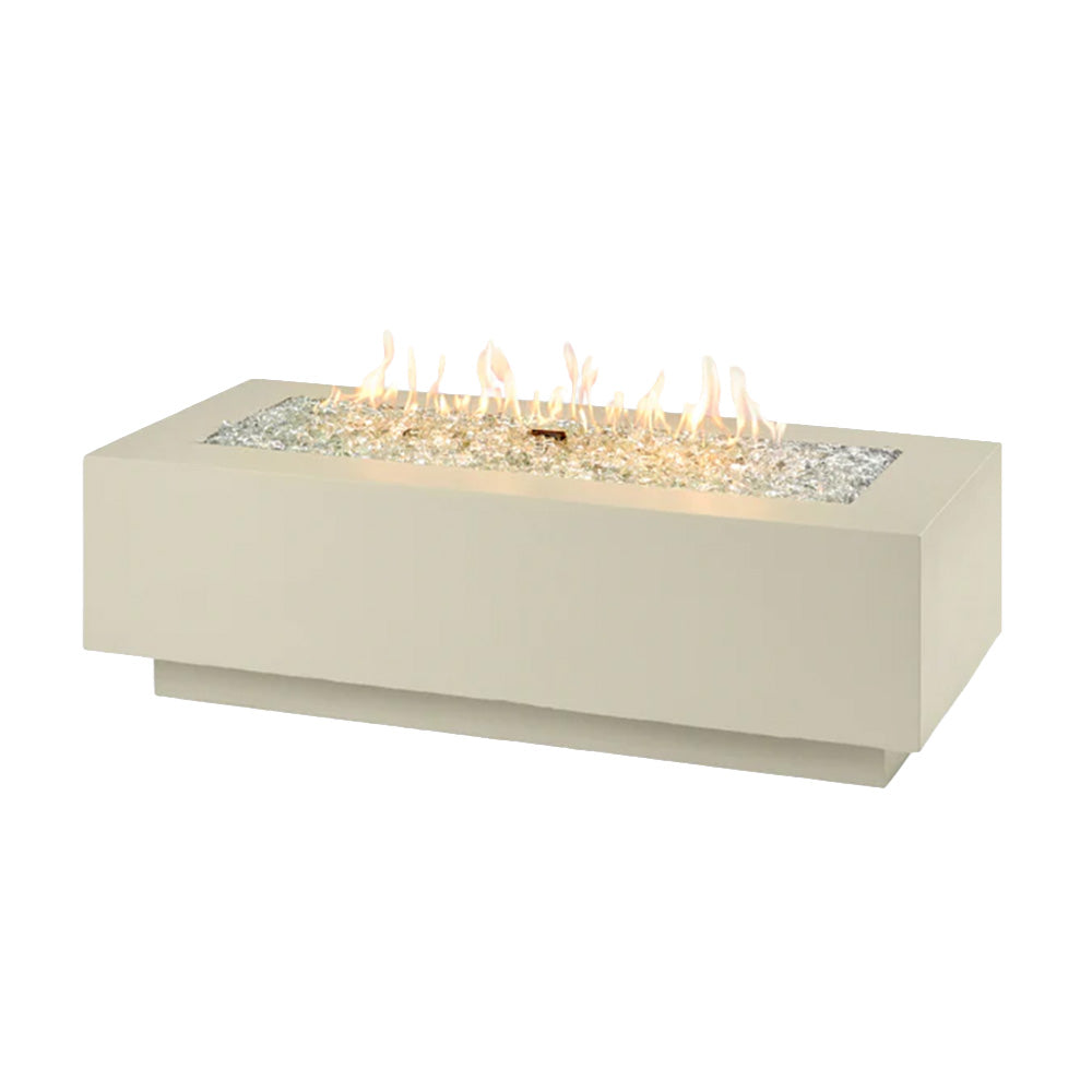 Linear gas fire pit table in light grey with long burner tray and visible flames