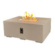 Light beige linear gas fire pit table showing top burner tray and side control panel with flames