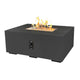 Dark charcoal linear gas fire pit table with control panel and bright flames in burner tray