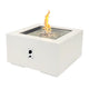 Square gas fire pit table in white, flame in center, control panel with knobs
