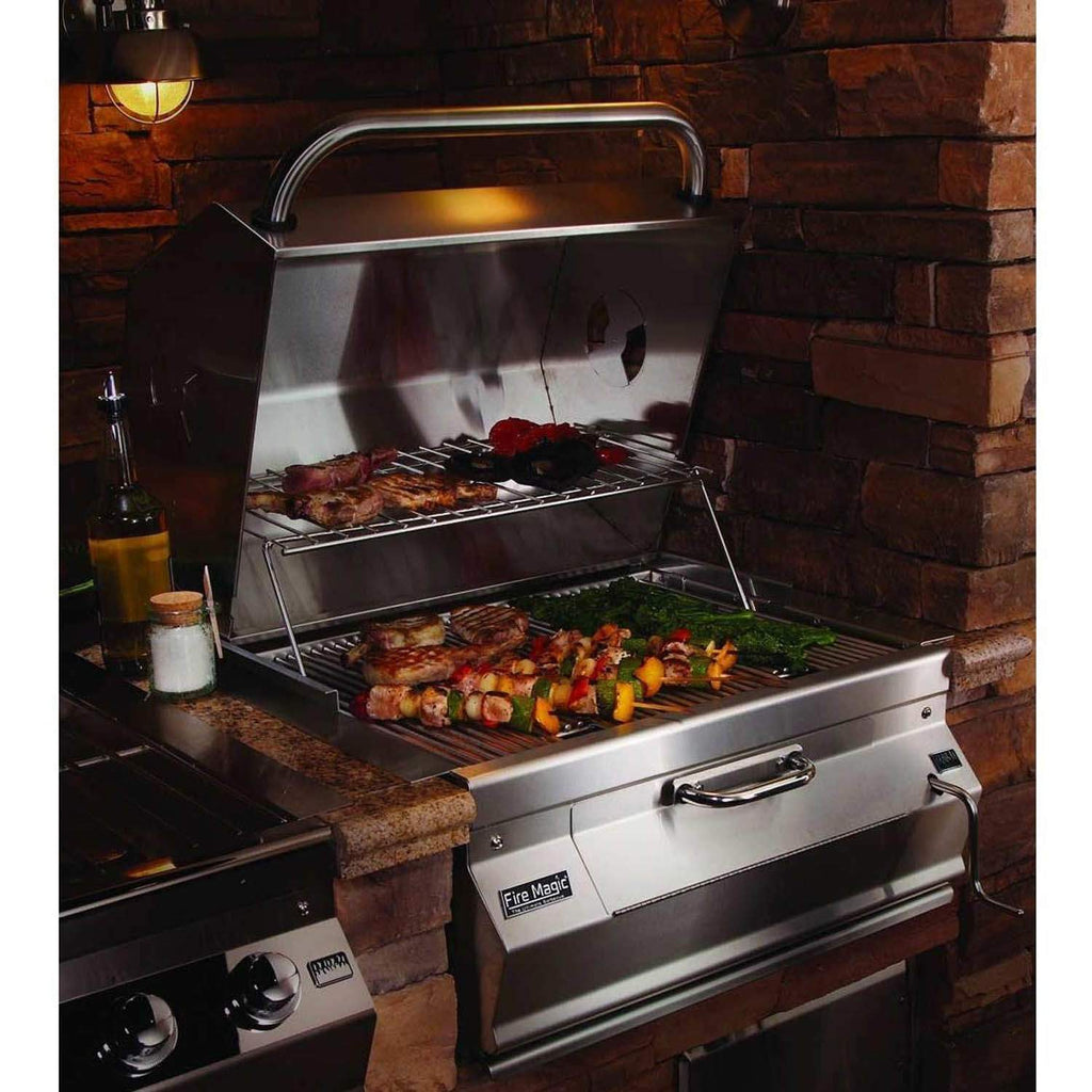 Built-in charcoal grill smoker, open hood with cooking grates and food