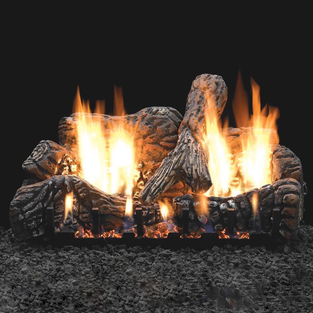 Charred oak vented ceramic fiber fireplace log set with glowing flames on dark logs