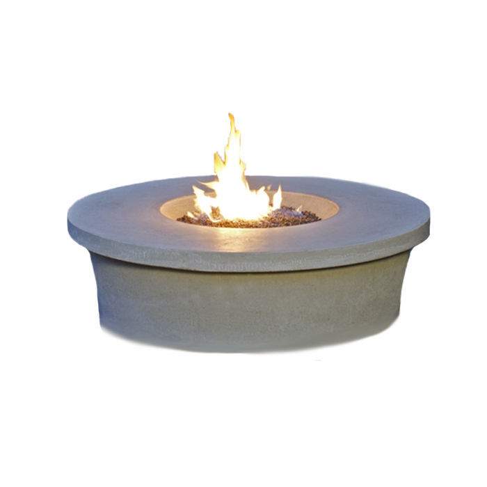 Round GFRC fire table with burning flame in central bowl, light gray finish.