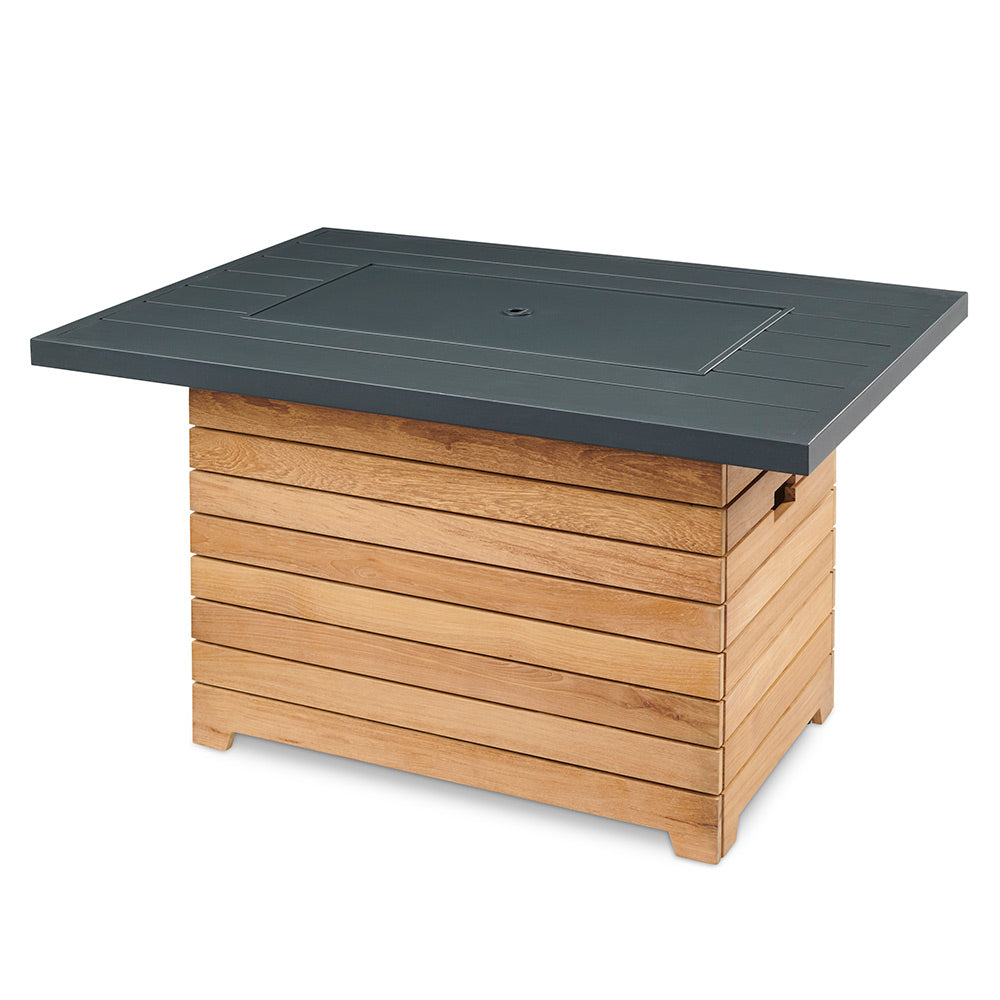 Gas fire pit table with dark aluminum tabletop and teak wood base, rectangular lid