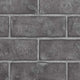 Decorative brick panel with dark gray rectangular block pattern