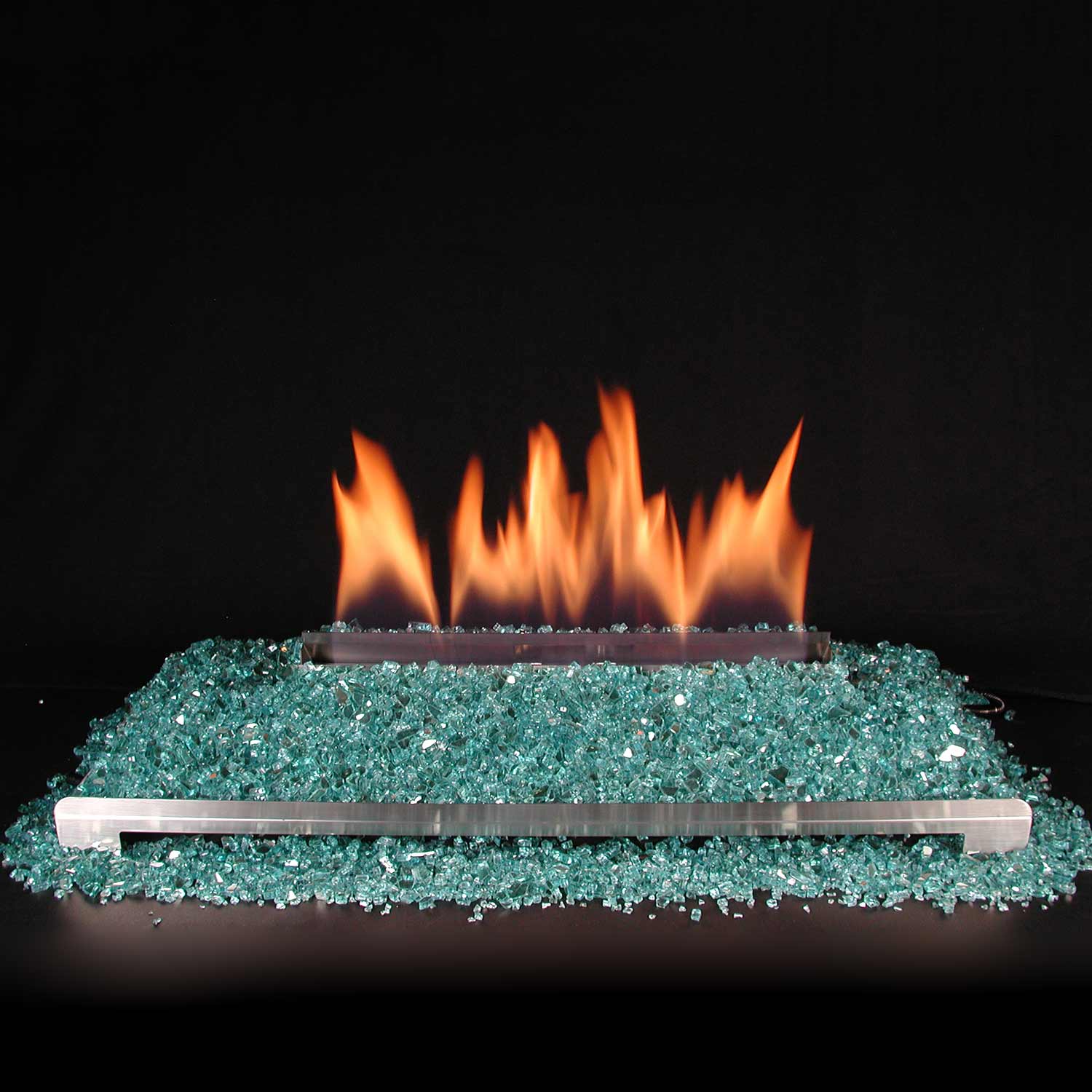 Ventless burner with blue-green fire-glass and orange flames