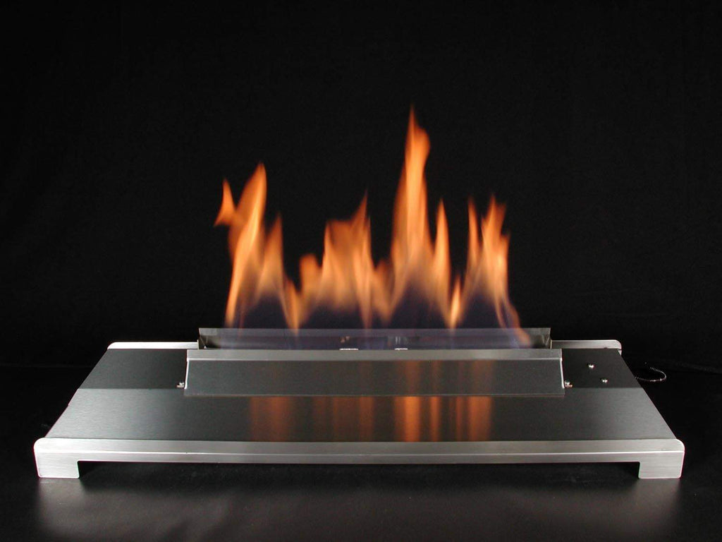 Ventless burner tray with glowing orange flame above clear fire glass bed