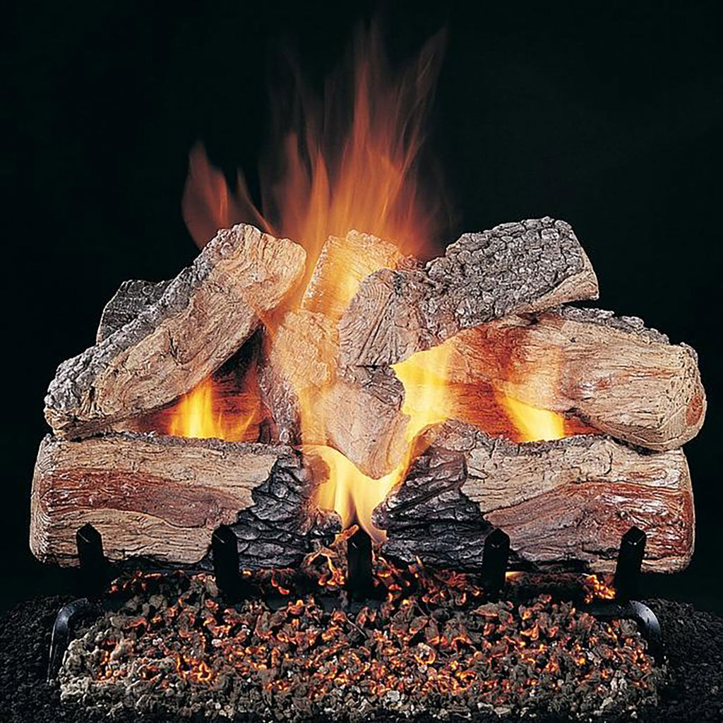 Gas log set with glowing flames and stacked wood logs