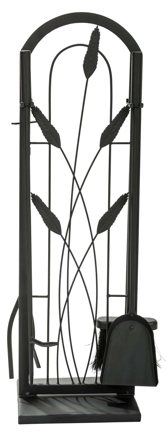 Black wrought-iron fireplace tool set with five tools in front stand