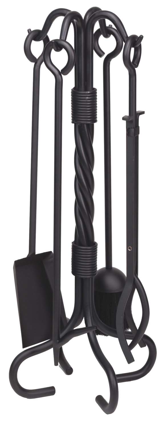 Black wrought iron fireplace tool set with stand and tools like poker, shovel, tongs, brush