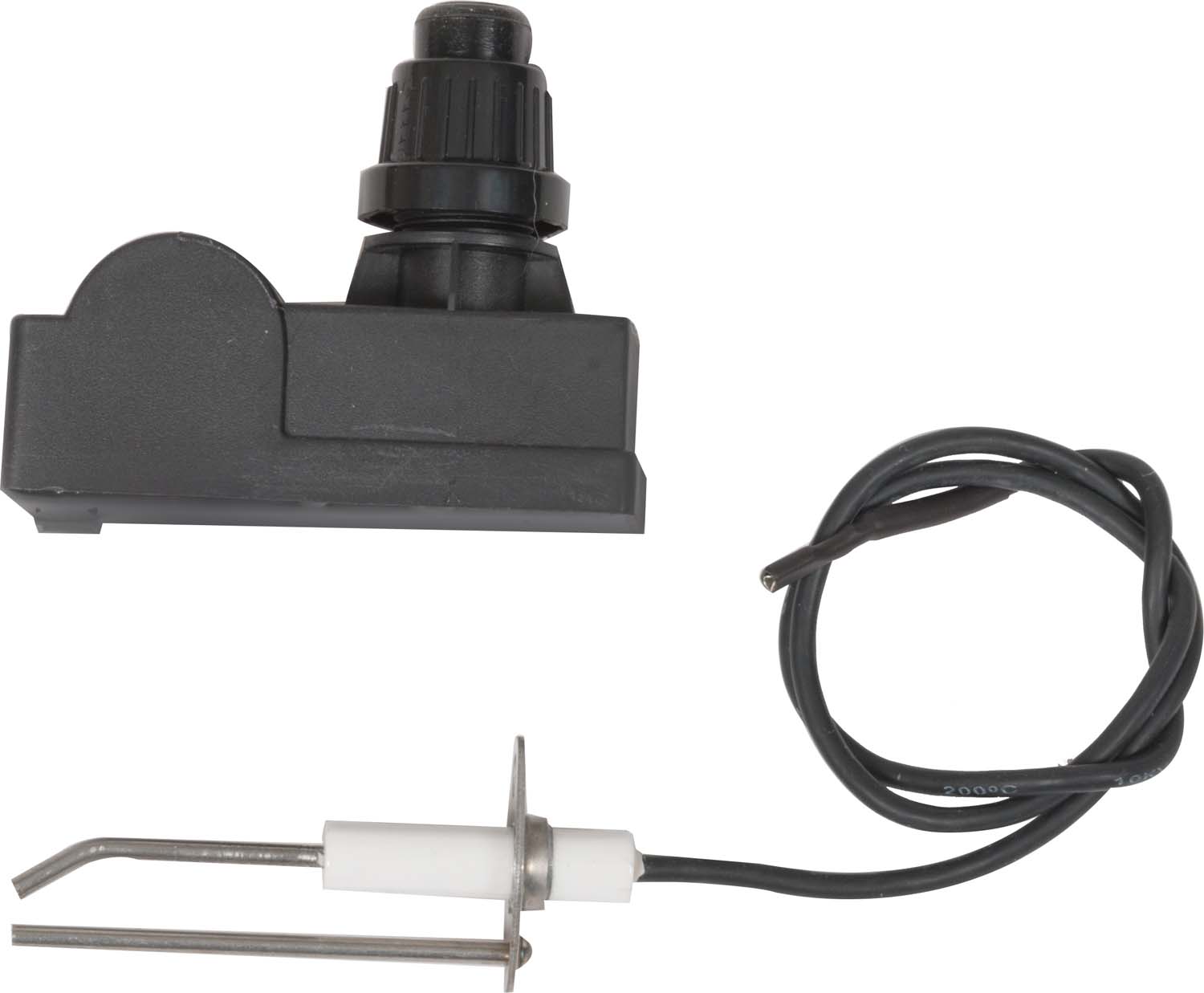 Ignitor kit with black plastic housing, spark electrode, and attached wiring harness.