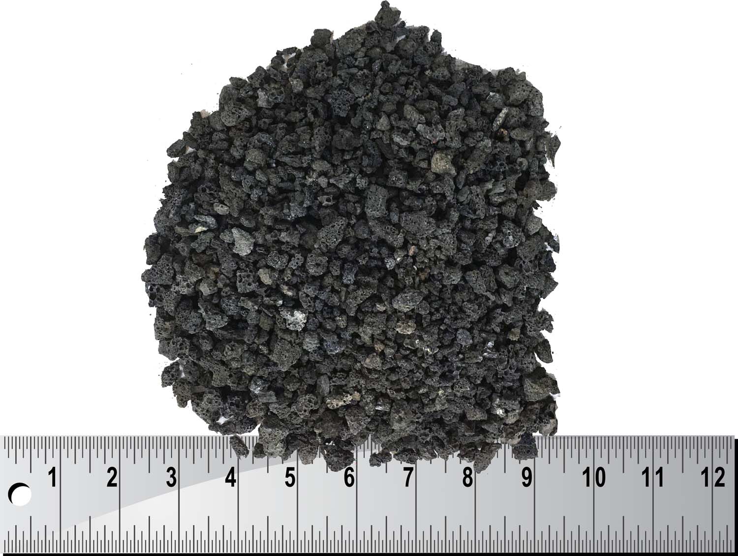 Lava rock cinders, dark black-gray granules piled together