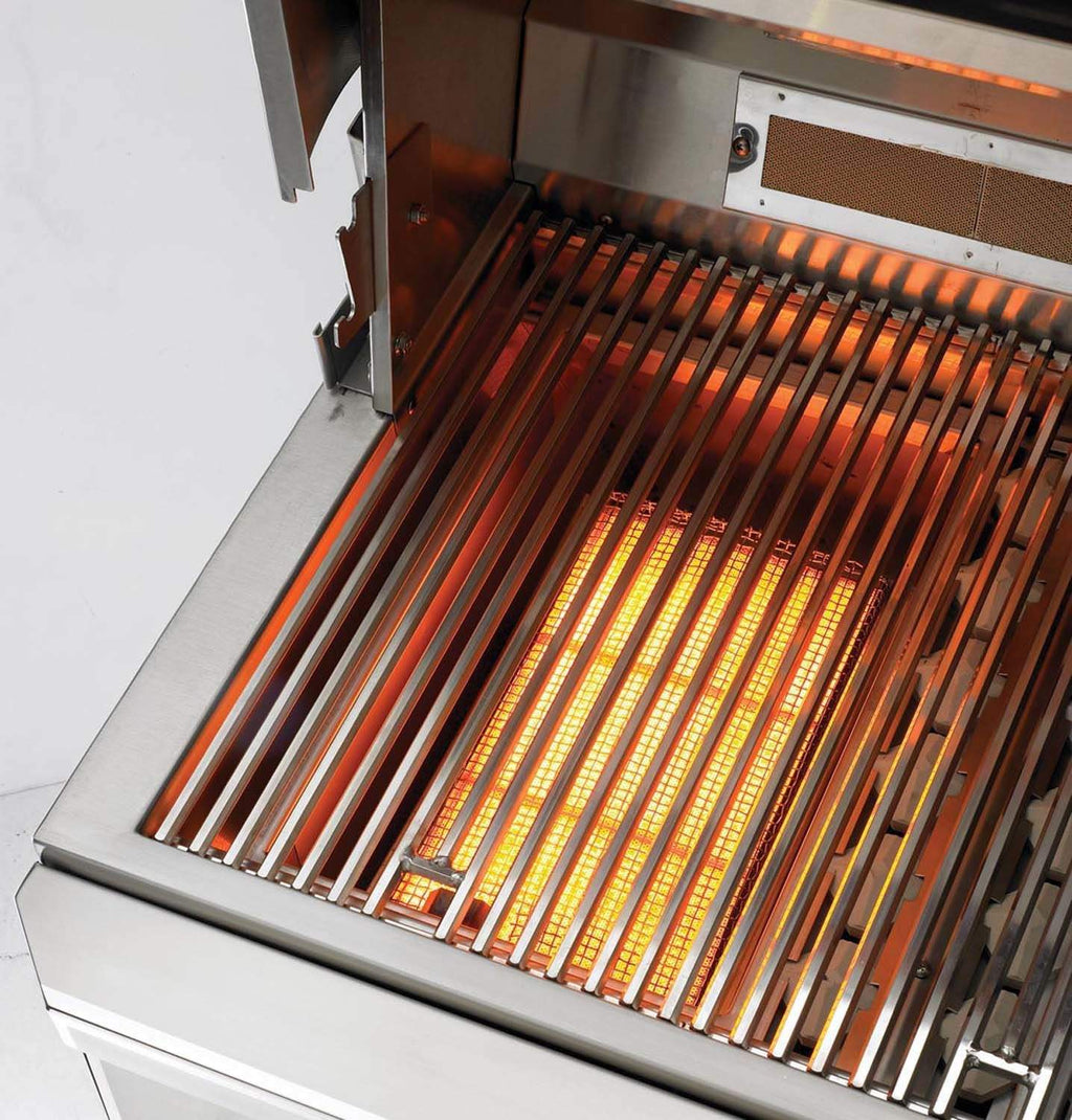 Open stainless grill with glowing infrared cooking bars and warming surface