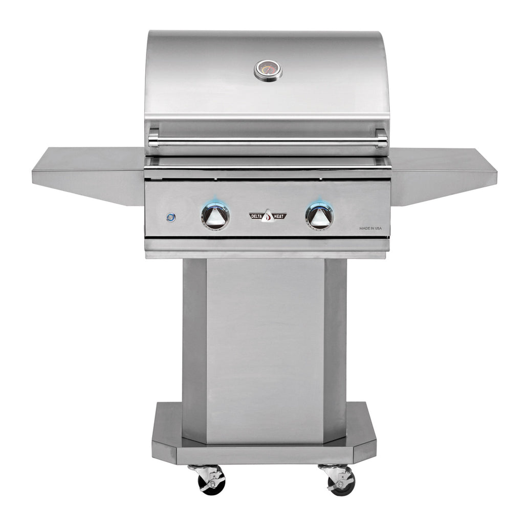 Freestanding stainless steel gas grill with lid, side shelves, and control knobs on pedestal