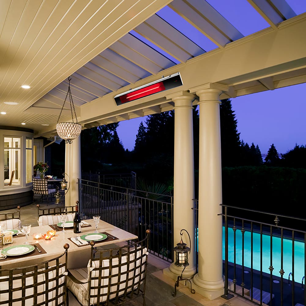 Ceiling-mounted infrared electric heater with red light glow under covered porch