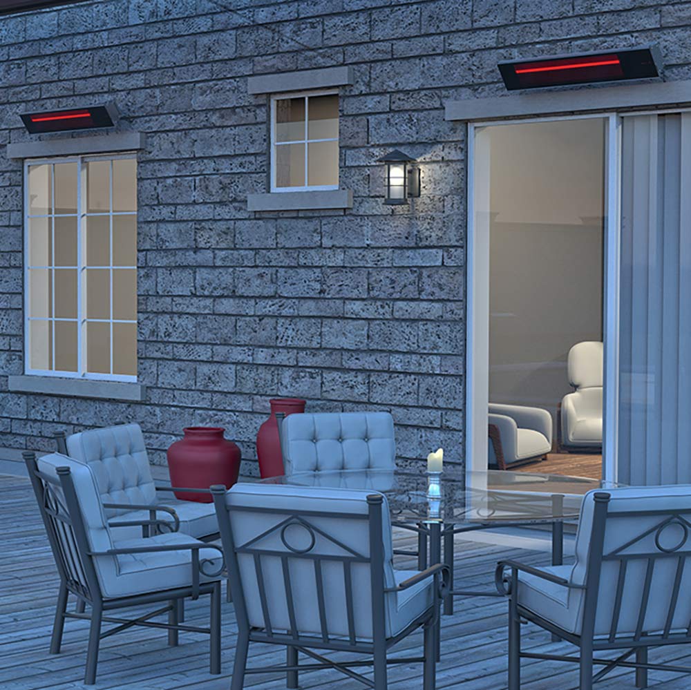 Wall-mounted infrared electric heater with red glow above outdoor seating