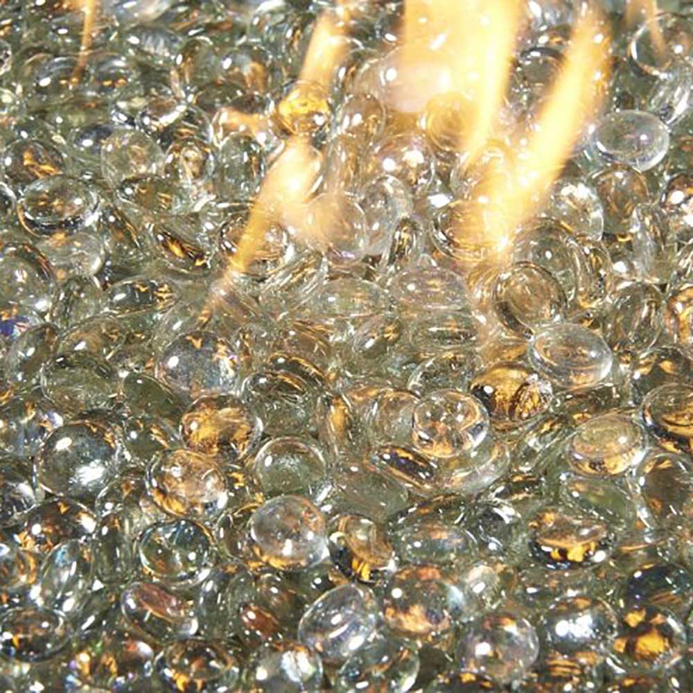 Clear and amber glass gems with flames inside round gas fire pit