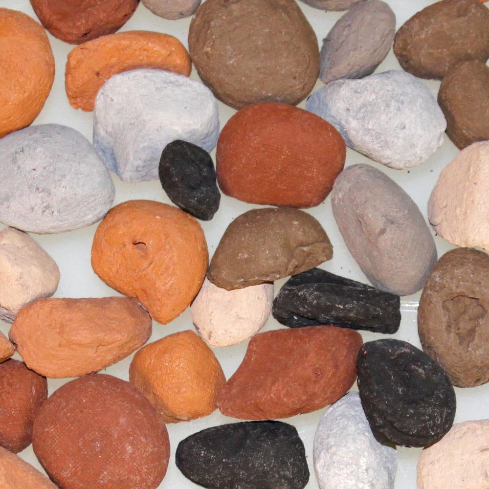 Decorative pebble assortment of assorted smooth stones in orange, white, brown, and black