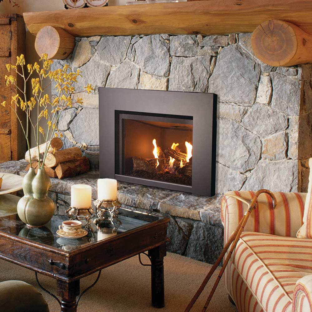 Black gas fireplace insert with glass front and burning logs, rectangular frame