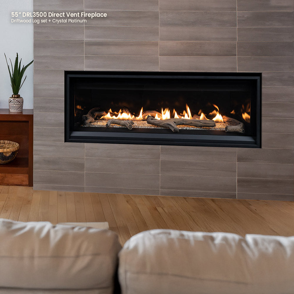 Direct vent gas fireplace with flames over crushed glass media, black surround
