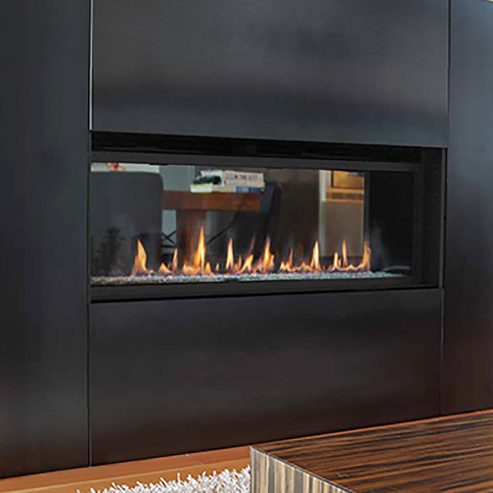 60-inch see-through gas fireplace showing burner flames behind clear glass panel
