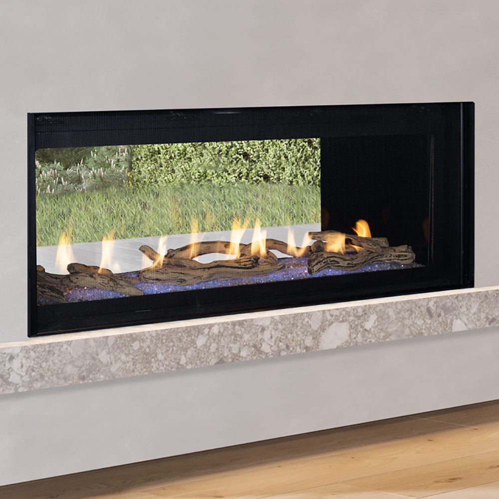 Linear see-through gas fireplace with black frame, flames over log media