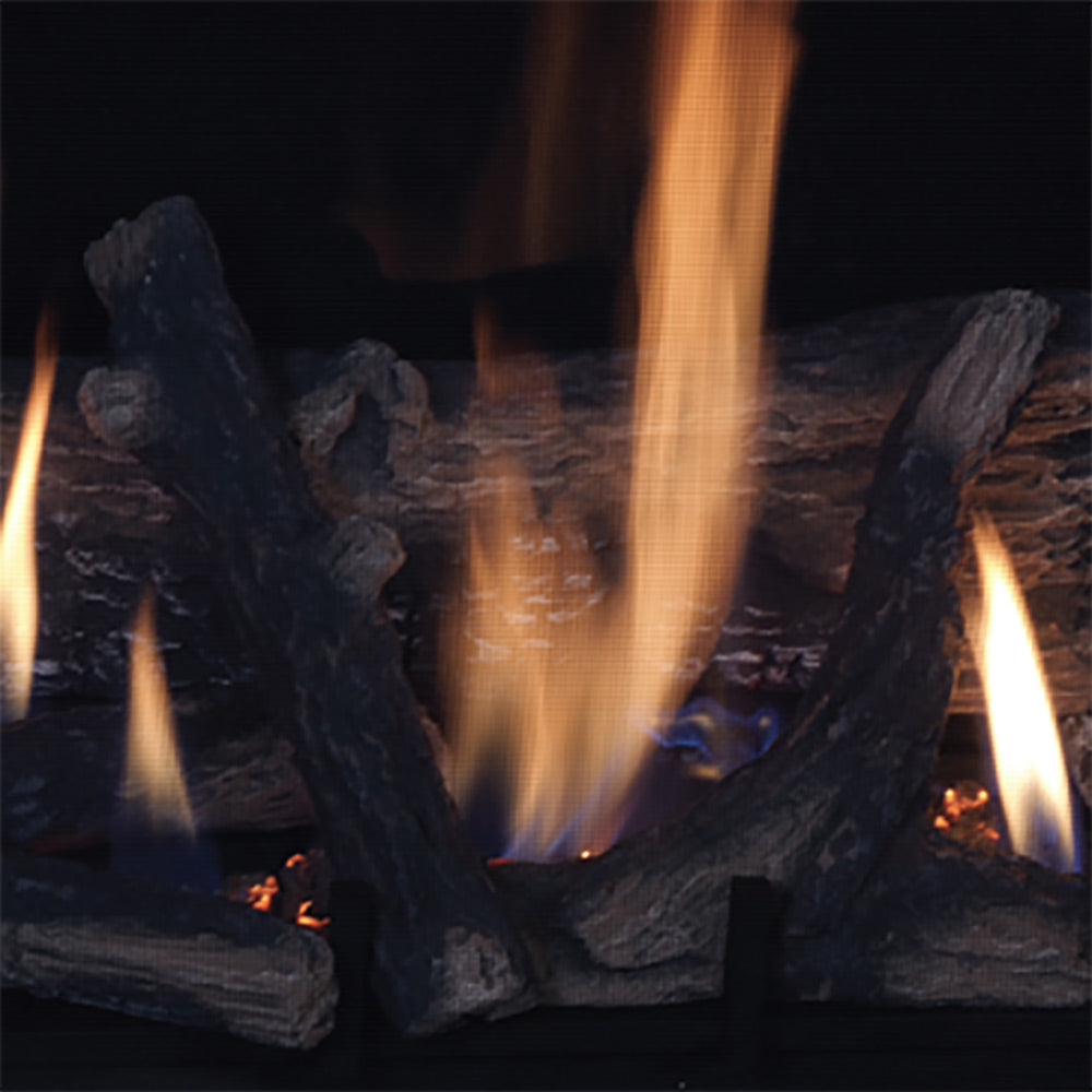 Charred log set with dancing flames inside black fireplace firebox