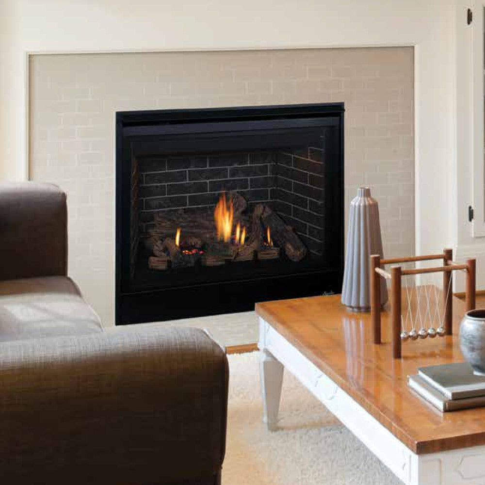 Black direct vent gas fireplace with burning logs in stacked ceramic brick surround
