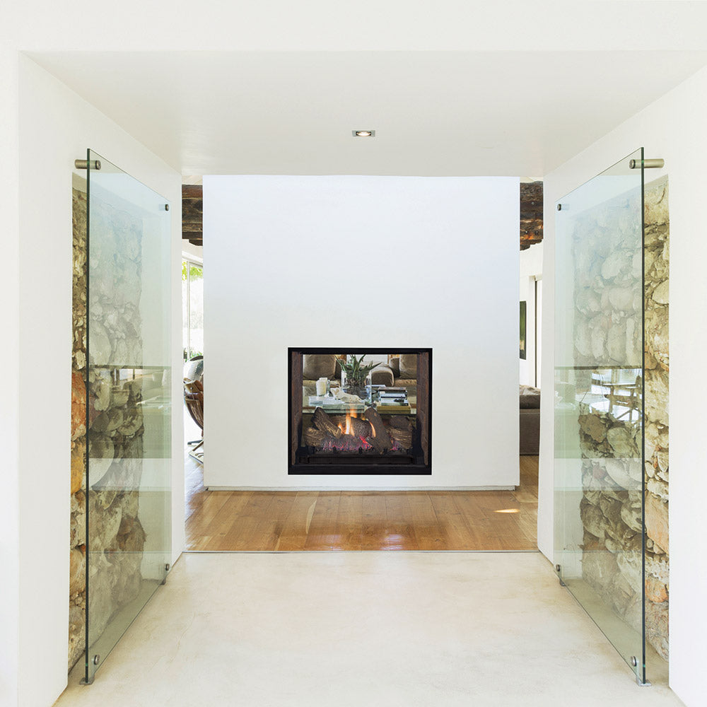 See-through glass direct vent fireplace in a room with open side panels