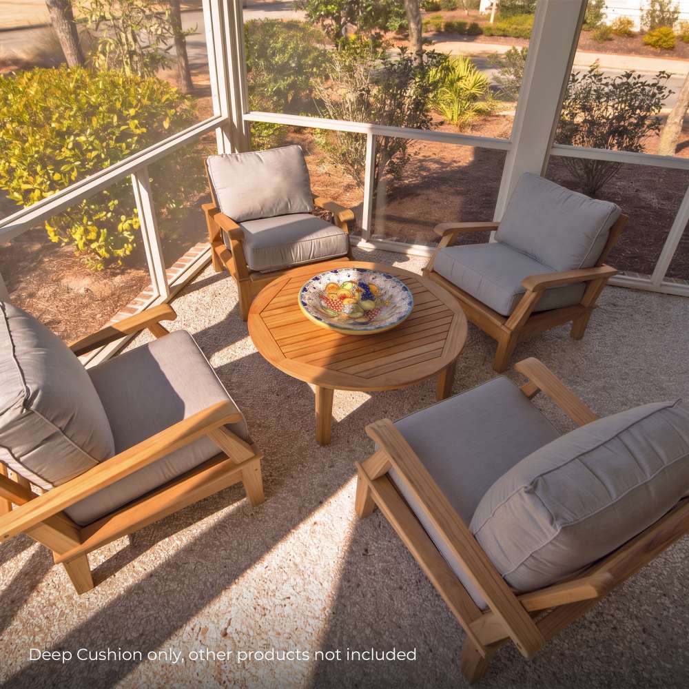 Square outdoor seating cushion with light gray fabric and matching piping