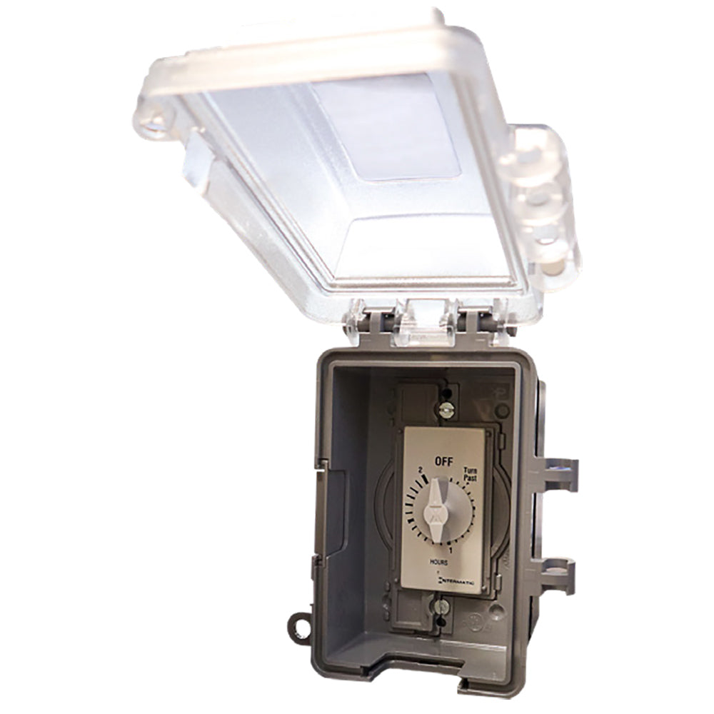 Dial timer switch in open dark enclosure with ON/OFF dial and timer markings