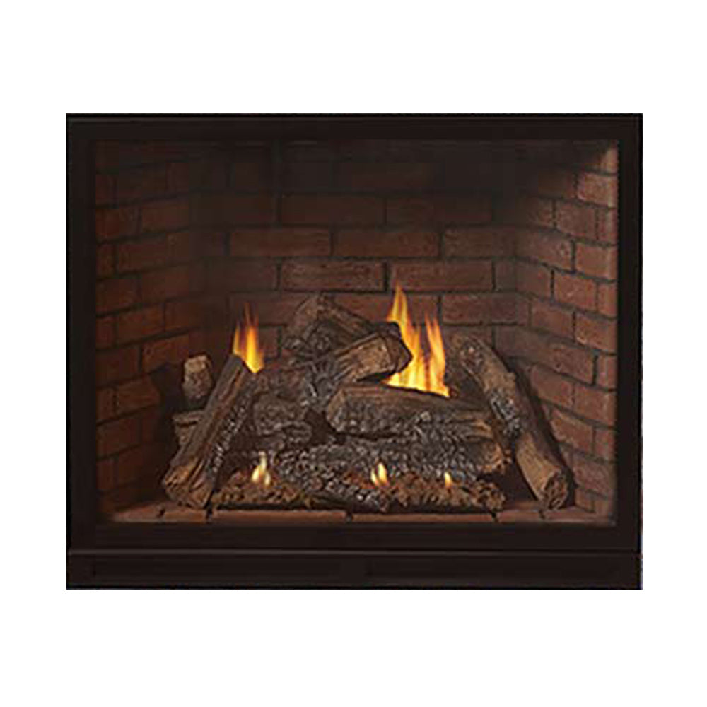 Direct vent gas fireplace insert with glowing flames and stacked log set in dark firebox