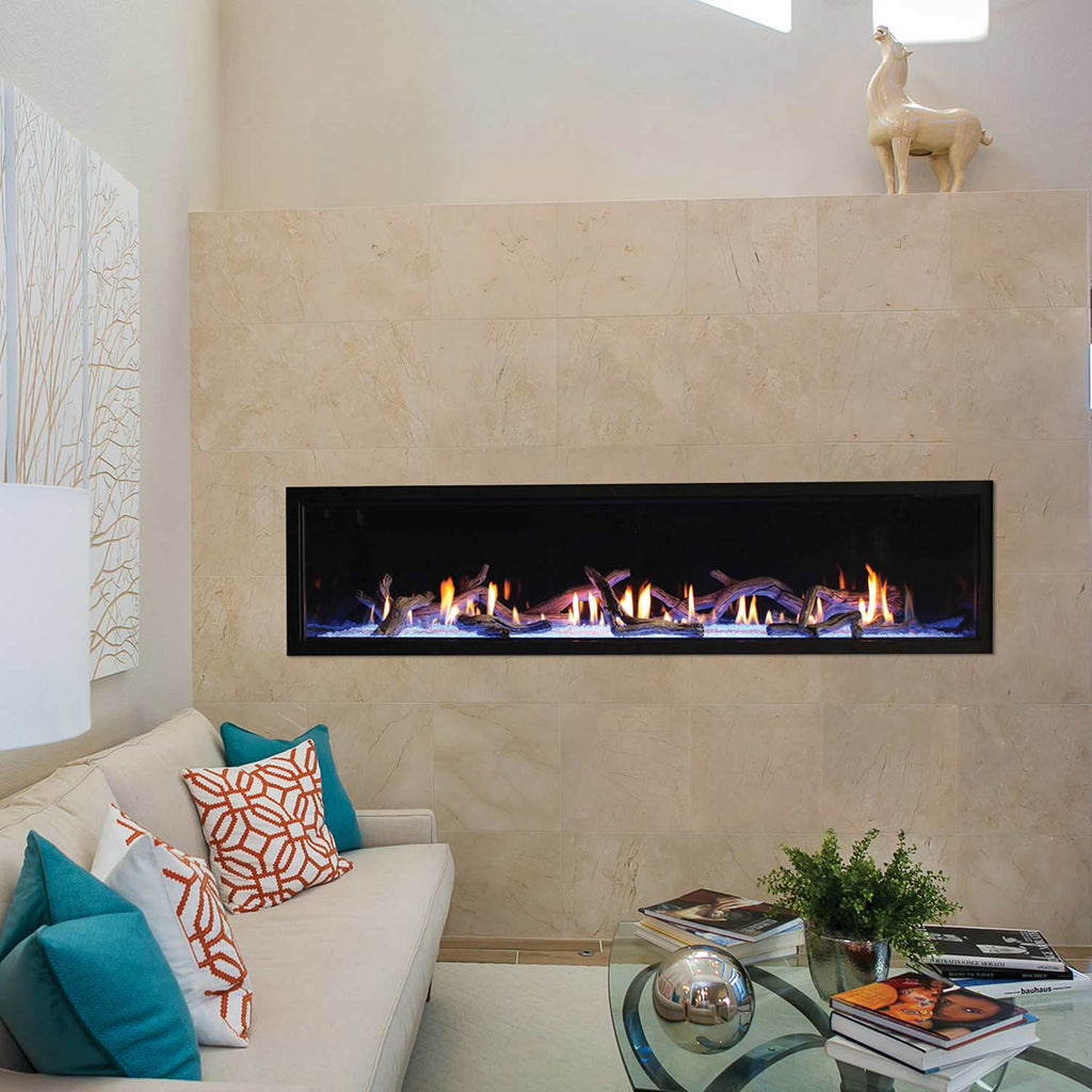 Linear direct-vent fireplace in a wall opening with visible burning flames behind glass