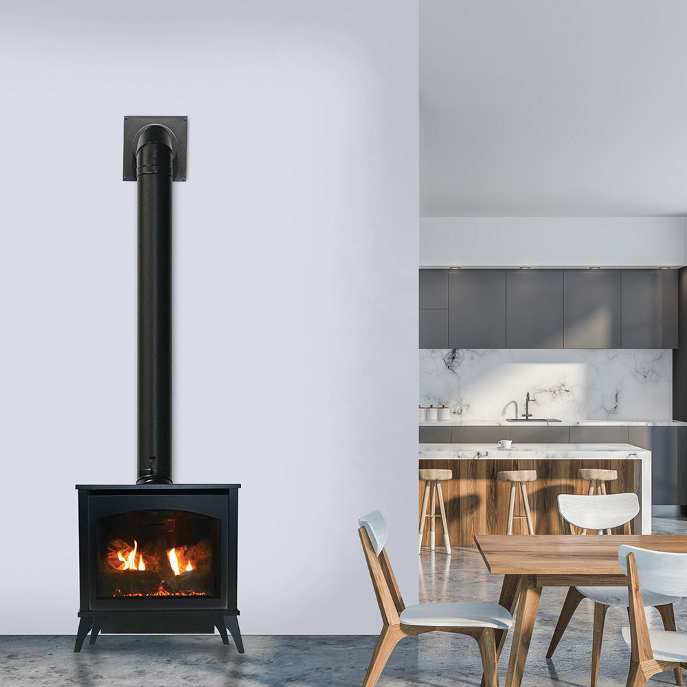 Black steel stove with vertical vent pipe and lit firebox