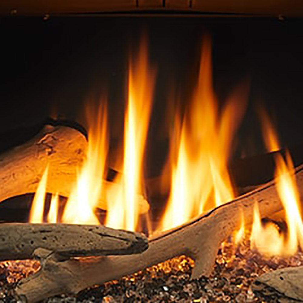 Driftwood log set with burning flames and charred logs