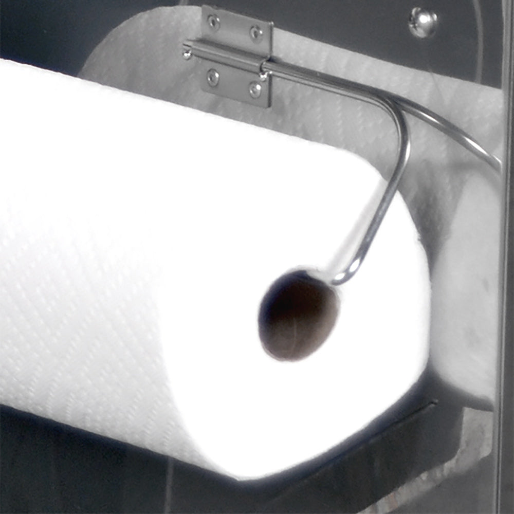 Towel rack with metal arm holding a paper towel roll on a stainless steel door