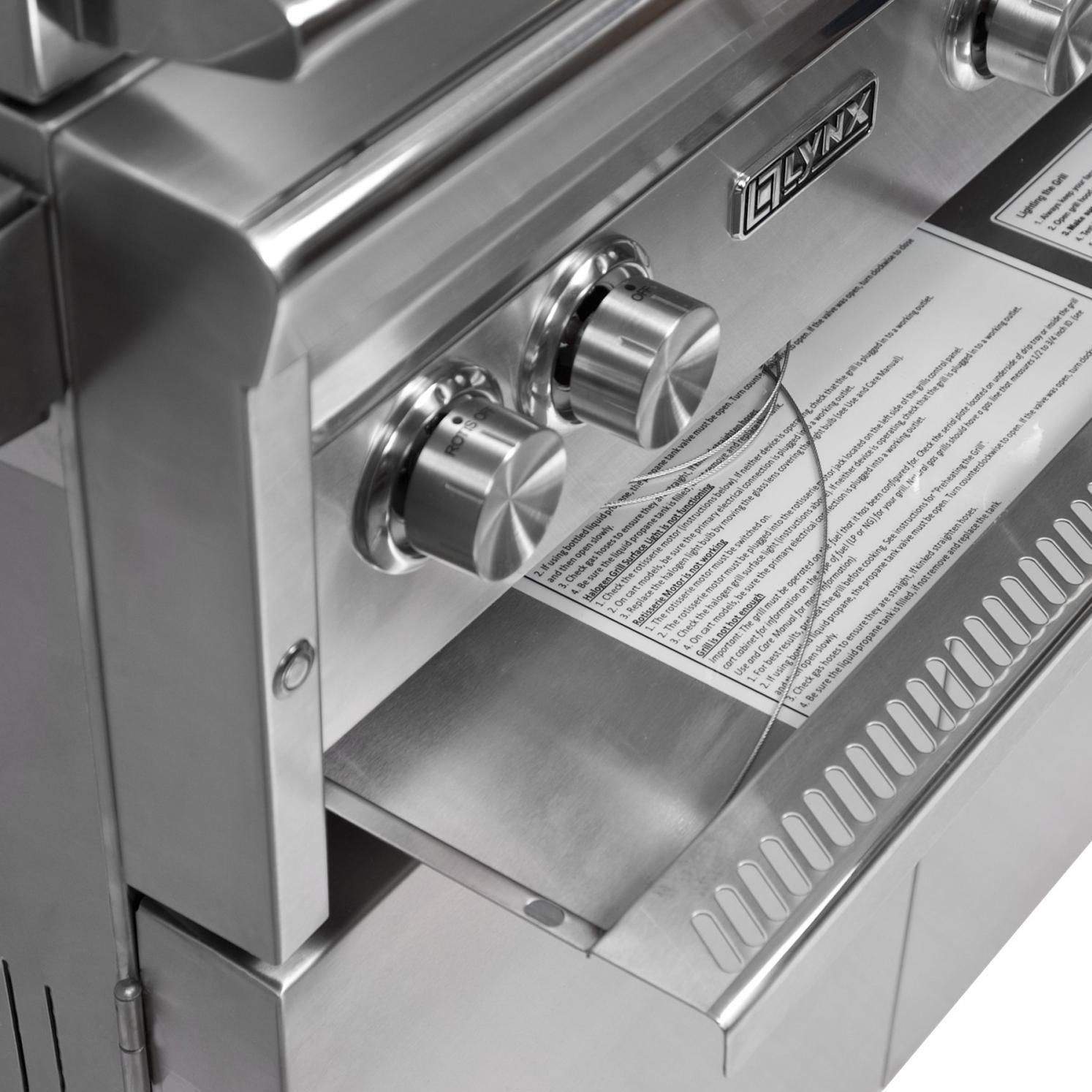 Built-in gas grill with stainless control knobs and instruction label panel