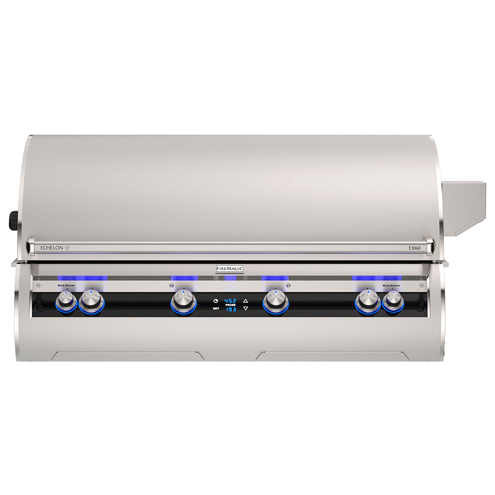 Built-in gas grill with stainless hood and row of blue-lit control knobs