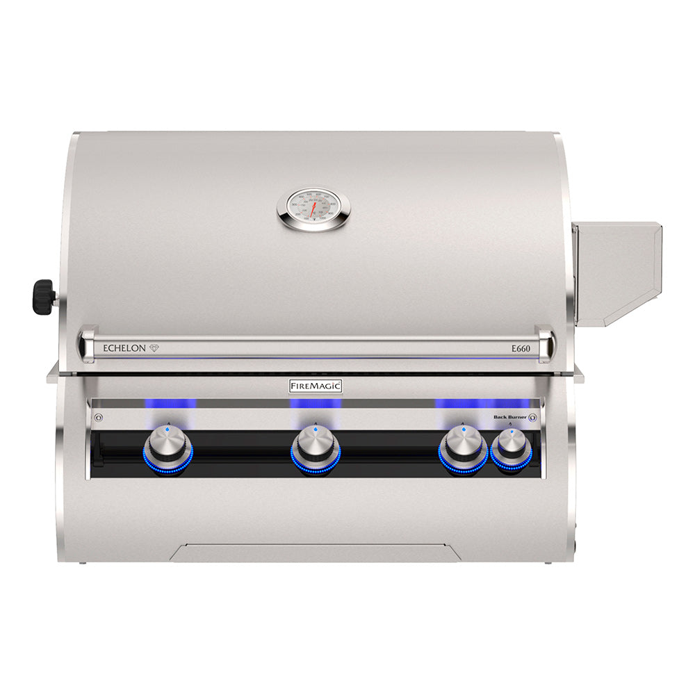 Built-in gas grill with thermometer on lid and stainless control knobs